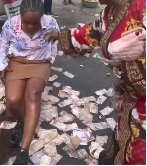Mother Makes Money Rain On Graduating Daughter Who Visited Her Shop After Signing Out
